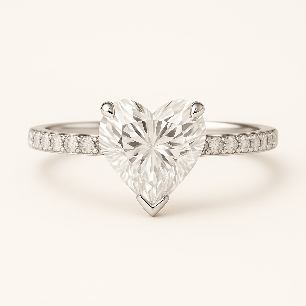 4.50 CT Lab Grown Heart Cut Diamond Solitaire Ring with Pavé Band in 14K White Gold: Elegant 4.50 carat lab grown heart cut diamond, prong set on a polished 14K white gold pavé band. A solitaire engagement ring that beautifully symbolizes love with timeless sparkle.Color Grade: D–F