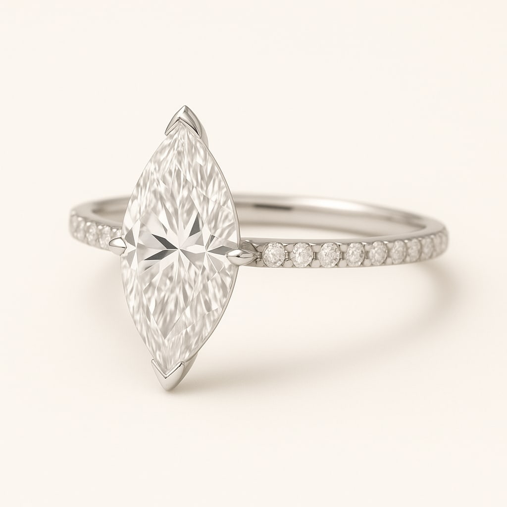 2.50 CT Lab Grown Marquise Cut Diamond Solitaire Ring with Pavé Band in 14K White Gold: Elegant 2.50 carat lab grown marquise cut diamond, prong set on a polished 14K white gold pavé band. A solitaire engagement ring that combines sleek elongated design with radiant brilliance.Color Gra