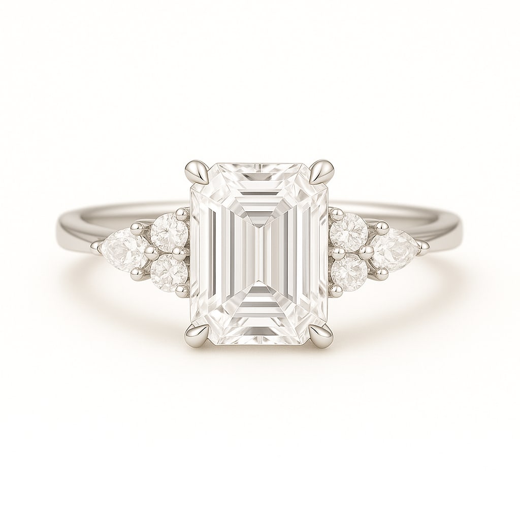 3.50 CT Lab Grown Emerald Cut Diamond Three-Stone Ring in 14K White Gold: Elegant 3.50 carat lab grown emerald cut diamond, accented with clusters of lab grown round brilliant diamonds on each side. Set in polished 14K white gold, this three-stone engagement ring is a perfe