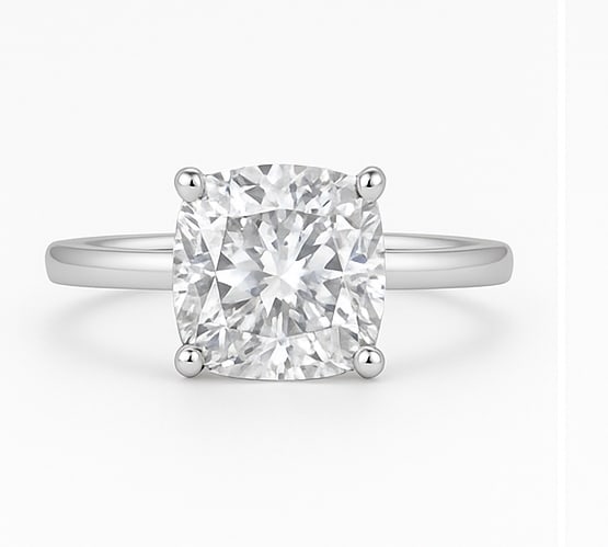 4.00 CT Lab Grown Cushion Cut Diamond Solitaire Ring in 14K White Gold: Elegant 4.00 carat lab grown cushion cut diamond, prong set on a polished 14K white gold band. A timeless solitaire engagement ring that blends soft curves with radiant sparkle.Color Grade: D–FClari