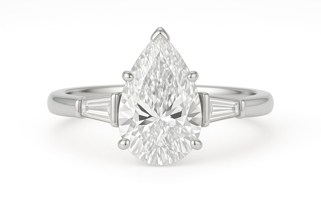7.50 CT Pear Cut Lab Grown Diamond Ring with Tapered Baguette Side Stones in 14K White Gold: A magnificent 7.50 carat pear cut lab grown diamond commands attention with its graceful teardrop shape, accented by tapered baguette side stones. Set on a polished 14K white gold band, this elegant t