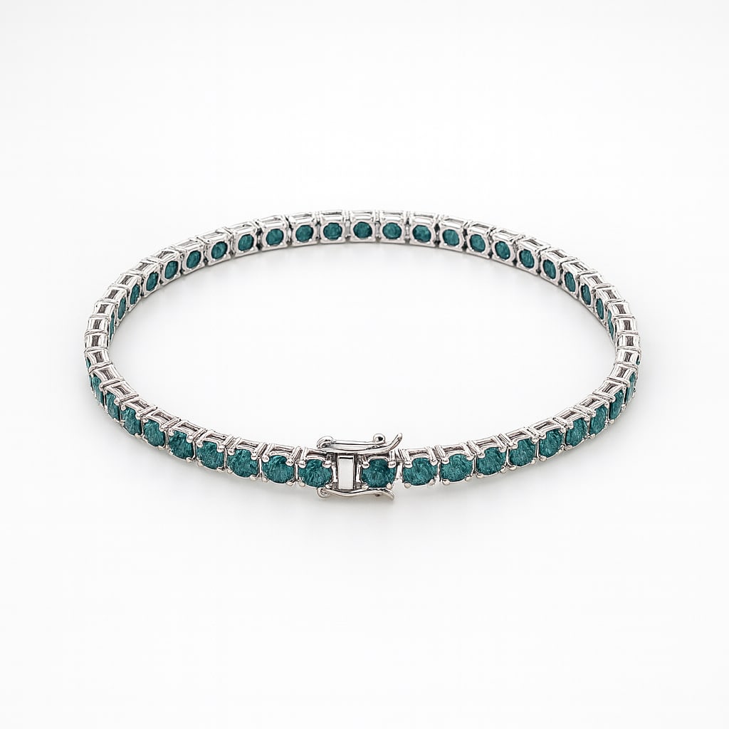 6.50 Ct Blue Lab Grown Diamond Tennis Bracelet in 14K White Gold: An elegant and luxurious tennis bracelet featuring approximately 6.50 carats total weight of vivid blue lab grown diamonds crafted in fine 14K white gold. This timeless bracelet showcases a continuous
