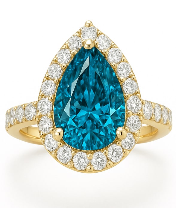 4.00 Ct Pear Cut Blue Lab Grown Diamond Halo Ring in 14K Yellow Gold: A breathtaking halo engagement ring featuring an approximately 4.00 carat pear cut blue lab grown diamond set in luxurious 14K yellow gold. The vivid ocean-blue center stone displays remarkable brilli