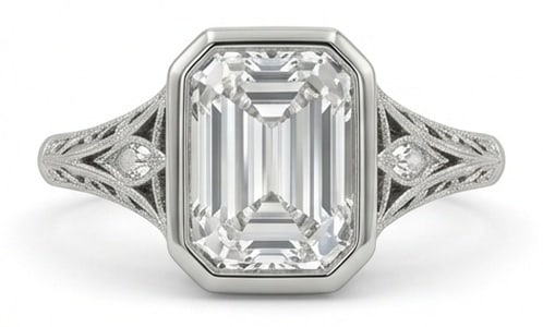 Lab Grown 6.00 Ct Emerald Cut Diamond Ring – Vintage Bezel Set with Split Shank Filigree – / in: Striking and elegant, this ring features a 6.00 carat lab grown Emerald Cut center diamond as the focal point. The vintage bezel set with split shank filigree design is paired with White Gold for a sl
