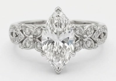 Lab Grown 3.00 Ct Marquise Diamond Ring – Floral Inspired Halo with Marquise Center – / in 14K: Distinctive in silhouette, this ring centers on a 3.00 carat lab grown Marquise center diamond as the focal point. The floral inspired halo with marquise center design is paired with White Gold for a 