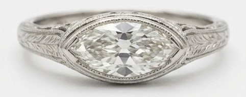 Lab Grown 3.00 Ct Marquise Diamond Ring – Art Deco East-West Bezel Set – / in 14K White Gold: A timeless statement, this ring highlights a 3.00 carat lab grown Marquise center diamond as the focal point. The art deco east-west bezel set design is paired with White Gold for a sleek, refined pre