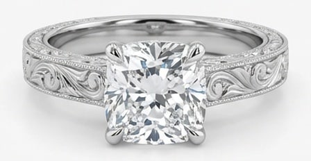 Lab Grown 4.00 Ct Cushion (Old Mine Look) Diamond Ring – Vintage Solitaire with Hand-Engraved: A timeless statement, this ring highlights a 4.00 carat lab grown Cushion (Old Mine Look) center diamond as the focal point. The vintage solitaire with hand-engraved scrolls design is paired with Whit