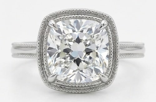 Lab Grown 5.00 Ct Cushion (Old Mine Look) Diamond Ring – Cushion Halo with Milgrain Bezel & Band: Sophisticated and modern, this ring is defined by a 5.00 carat lab grown Cushion (Old Mine Look) center diamond. Featuring the Cushion Halo with Milgrain Bezel & Band theme, offering a distinctive top