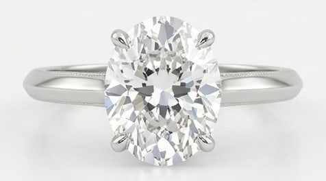 Lab Grown 4.00 Ct Oval Diamond Ring – Classic Knife-Edge Oval Solitaire – / in 14K White Gold: Chic and distinctive, this ring showcases a 4.00 carat lab grown Oval center diamond. White Gold gives the piece a refined, neutral foundation for daily wear or events. The overall style follows a cla