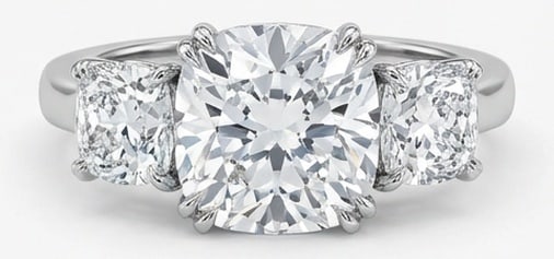 Lab Grown 5.00 Ct Cushion (Modified Brilliant) Diamond Ring – Classic Three-Stone Cushion (Cushion: Bold yet refined, this design showcases a 5.00 carat lab grown Cushion (Modified Brilliant) center diamond. Set in White Gold , the ring is styled with classic three-stone cushion (cushion sides) deta
