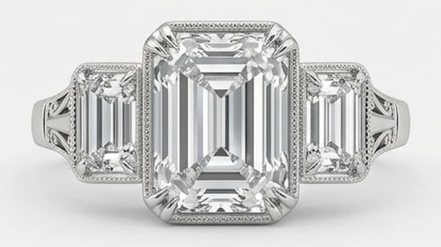 Lab Grown 4.00 Ct Emerald Cut Diamond Ring – Vintage Three-Stone Emerald Cut with Milgrain – /: Classic with a contemporary edge, this ring spotlights a 4.00 carat lab grown Emerald Cut center diamond. Set in White Gold , the ring is styled with vintage three-stone emerald cut with milgrain deta