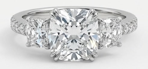 Lab Grown 4.00 Ct Cushion Diamond Ring – Three-stone setting with pave-set diamond band – in 14K: Bold yet refined, this design showcases a 4.00 carat lab grown Cushion center diamond. Set in White Gold, the ring is styled with three-stone setting with pave-set diamond band details that define its