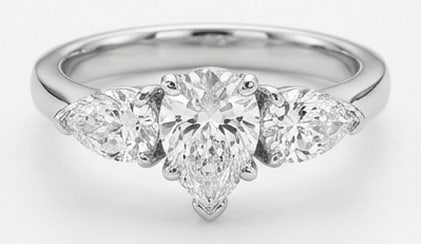Lab Grown 4.00 Ct Pear Diamond Ring – Simple three-stone setting with pear side stones and: Beautifully styled, this ring is anchored by a 4.00 carat lab grown Pear center diamond as the focal point. The simple three-stone setting with pear side stones and polished band design is paired with
