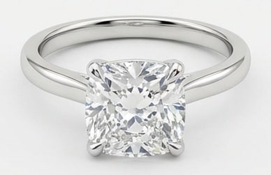 Lab Grown 8.00 Ct Cushion Diamond Ring – Solitaire setting with double claw prongs and plain: Striking and elegant, this ring features a 8.00 carat lab grown Cushion center diamond. Featuring the Solitaire setting with double claw prongs and plain tapered band styling that frames the centerpie