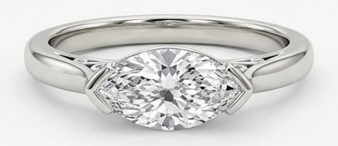 Lab Grown 3.00 Ct Marquise Diamond Ring – East-West marquise setting with semi-bezel shoulders and: Chic and distinctive, this ring showcases a 3.00 carat lab grown Marquise center diamond. Set in White Gold, the ring is styled with east-west marquise setting with semi-bezel shoulders and vintage de