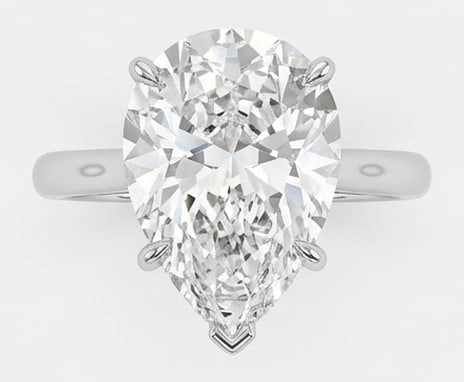 Lab Grown 5.00 Ct Pear Diamond Ring – Classic pear solitaire with V-tip prong and plain band –: Sophisticated and modern, this ring is defined by a 5.00 carat lab grown Pear center diamond. Featuring the Classic pear solitaire with V-tip prong and plain band theme, offering a distinctive top vie