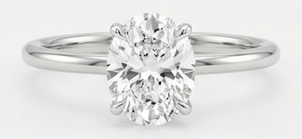 Lab Grown 3.00 Ct Oval Diamond Ring – Minimalist oval solitaire with thin rounded band – in 14K: Beautifully styled, this ring is anchored by a 3.00 carat lab grown Oval center diamond as the focal point. The minimalist oval solitaire with thin rounded band design is paired with White Gold for a 