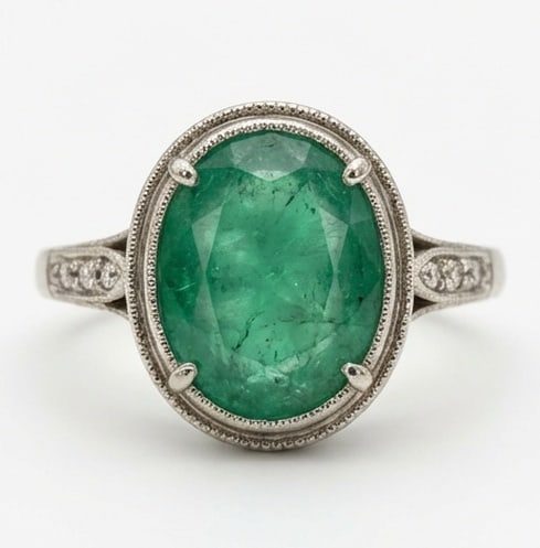 3.5 Ct Oval Natural Emerald 14K White Gold Vintage Bezel Set Halo Ring - Certified: This certified fine jewelry piece features a 3.5 carat natural Emerald in a Oval cut, crafted in 14K White Gold. The Vintage Bezel Set Halo design highlights the beauty of the natural center stone. It