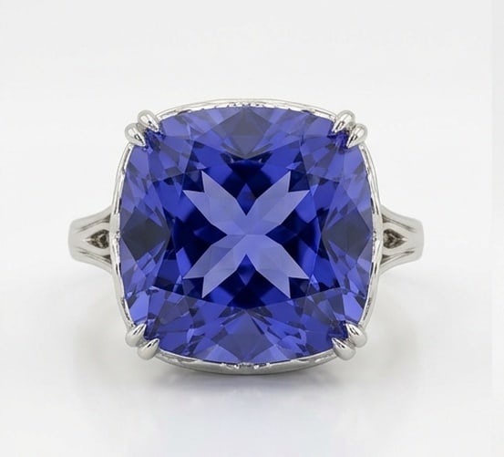 4.0 Ct Cushion Natural Tanzanite 14K White Gold Solitaire with Split Shank Detail Ring - Certified: This certified fine jewelry piece features a 4.0 carat natural Tanzanite in a Cushion cut, crafted in 14K White Gold. The Solitaire with Split Shank Detail design highlights the beauty of the natural 