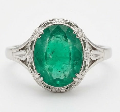 3.5 Ct Oval Natural Emerald 14K White Gold Vintage Solitaire with Engraving Ring - Certified: This certified fine jewelry piece features a 3.5 carat natural Emerald in a Oval cut, crafted in 14K White Gold. The Vintage Solitaire with Engraving design highlights the beauty of the natural center