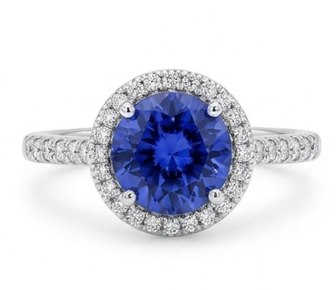 3.0 Ct Oval Natural Tanzanite 14K White Gold Hidden Halo / Cathedral Ring - Certified: This certified fine jewelry piece features a 3.0 carat natural Tanzanite in a Oval cut, crafted in 14K White Gold. The Hidden Halo / Cathedral design highlights the beauty of the natural center stone.