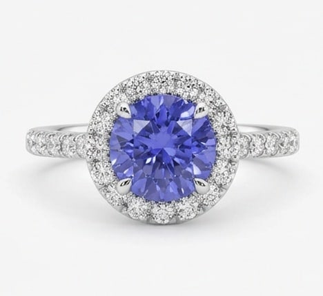 2.5 Ct Round Natural Tanzanite 14K White Gold Halo Setting with Pave Shank Ring - Certified: This certified fine jewelry piece features a 2.5 carat natural Tanzanite in a Round cut, crafted in 14K White Gold. The Halo Setting with Pave Shank design highlights the beauty of the natural center 
