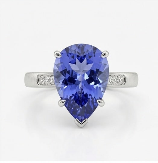 4.0 Ct Pear Natural Tanzanite 14K White Gold Solitaire with Inset Pave Accents Ring - Certified: This certified fine jewelry piece features a 4.0 carat natural Tanzanite in a Pear cut, crafted in 14K White Gold. The Solitaire with Inset Pave Accents design highlights the beauty of the natural cen