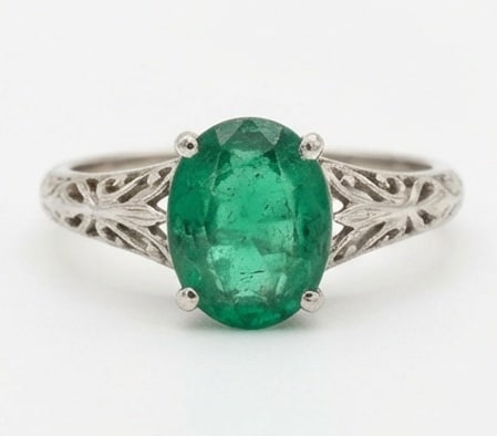2.5 Ct Oval Natural Emerald 14K White Gold Vintage Solitaire with Filigree Ring - Certified: This certified fine jewelry piece features a 2.5 carat natural Emerald in a Oval cut, crafted in 14K White Gold. The Vintage Solitaire with Filigree design highlights the beauty of the natural center 