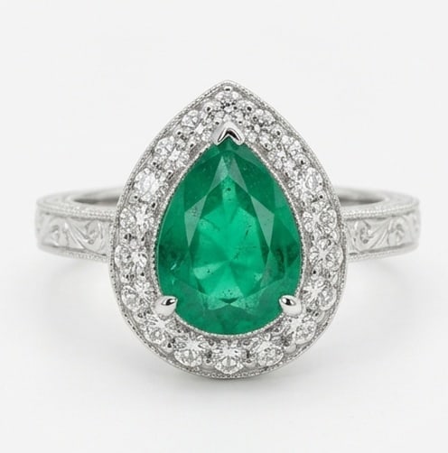 2.0 Ct Pear Natural Emerald 14K White Gold Vintage Halo with Engraving Ring - Certified: This certified fine jewelry piece features a 2.0 carat natural Emerald in a Pear cut, crafted in 14K White Gold. The Vintage Halo with Engraving design highlights the beauty of the natural center ston