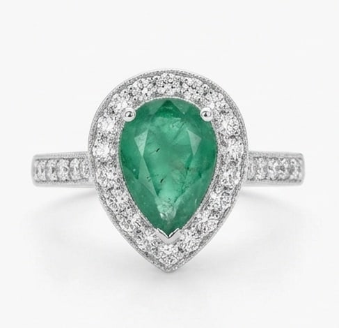 2.0 Ct Pear Natural Emerald 14K White Gold Halo Setting with Pave Shank Ring - Certified: This certified fine jewelry piece features a 2.0 carat natural Emerald in a Pear cut, crafted in 14K White Gold. The Halo Setting with Pave Shank design highlights the beauty of the natural center sto