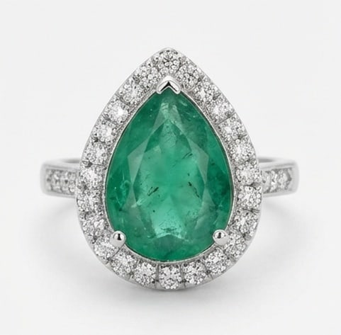 3.5 Ct Pear Natural Emerald 14K White Gold Halo Setting with Pave Shank Ring - Certified: This certified fine jewelry piece features a 3.5 carat natural Emerald in a Pear cut, crafted in 14K White Gold. The Halo Setting with Pave Shank design highlights the beauty of the natural center sto