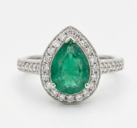 2.0 Ct Pear Natural Emerald 14K White Gold Halo Setting with Vintage Edge Ring - Certified: This certified fine jewelry piece features a 2.0 carat natural Emerald in a Pear cut, crafted in 14K White Gold. The Halo Setting with Vintage Edge design highlights the beauty of the natural center s