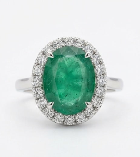 3.0 Ct Oval Natural Emerald 14K White Gold Halo Setting with Plain Shank Ring - Certified: This certified fine jewelry piece features a 3.0 carat natural Emerald in a Oval cut, crafted in 14K White Gold. The Halo Setting with Plain Shank design highlights the beauty of the natural center st