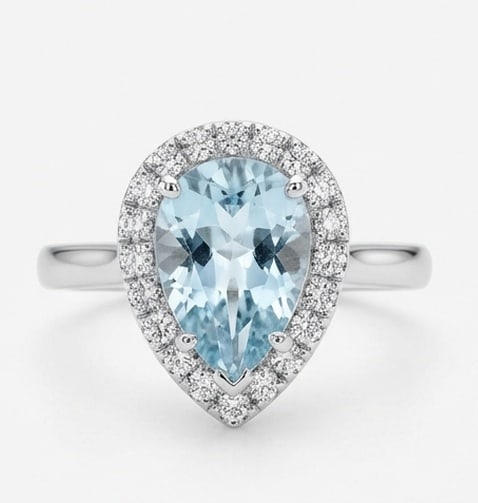 2.5 Ct Pear Natural Aquamarine 14K White Gold Halo Setting with Plain Shank Ring - Certified: This certified fine jewelry piece features a 2.5 carat natural Aquamarine in a Pear cut, crafted in 14K White Gold. The Halo Setting with Plain Shank design highlights the beauty of the natural center