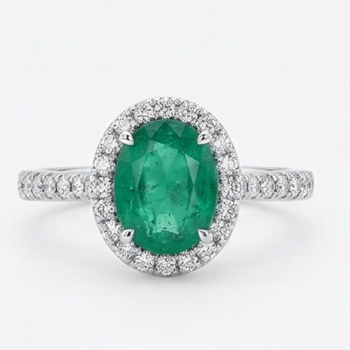 3.0 Ct Oval Natural Emerald 14K White Gold Halo Setting with Pave Shank Ring - Certified: This certified fine jewelry piece features a 3.0 carat natural Emerald in a Oval cut, crafted in 14K White Gold. The Halo Setting with Pave Shank design highlights the beauty of the natural center sto