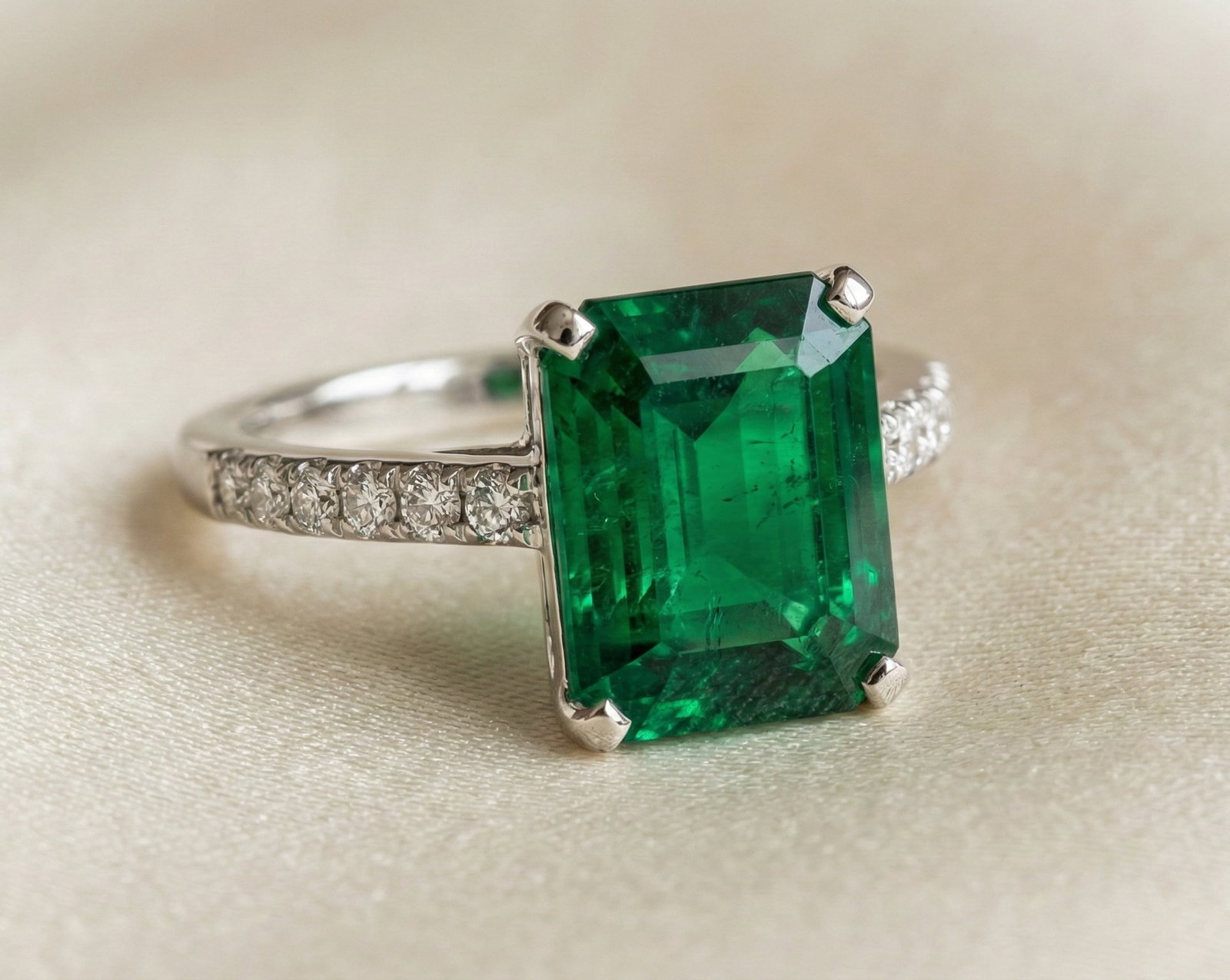 3.0 Ct Emerald Natural Emerald 14K White Gold Solitaire with Pave Shank Ring - Certified: This certified fine jewelry piece features a 3.0 carat natural Emerald in a Emerald cut, crafted in 14K White Gold. The Solitaire with Pave Shank design highlights the beauty of the natural center sto