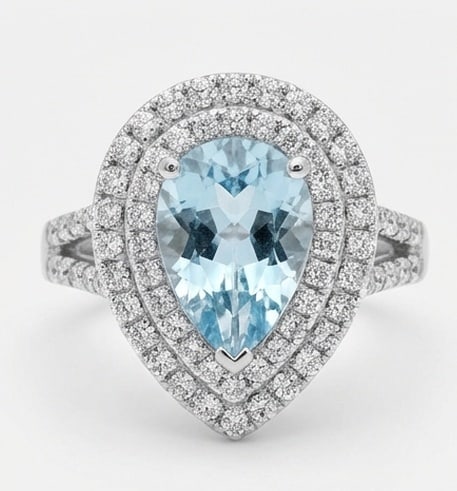 2.5 Ct Pear Natural Aquamarine 14K White Gold Double Halo with Split Shank Ring - Certified: This certified fine jewelry piece features a 2.5 carat natural Aquamarine in a Pear cut, crafted in 14K White Gold. The Double Halo with Split Shank design highlights the beauty of the natural center 