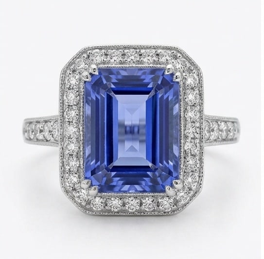 4.0 Ct Emerald Natural Tanzanite 14K White Gold Vintage Halo with Engraved Shank Ring - Certified: This certified fine jewelry piece features a 4.0 carat natural Tanzanite in a Emerald cut, crafted in 14K White Gold. The Vintage Halo with Engraved Shank design highlights the beauty of the natural c