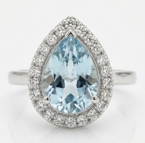 2.5 Ct Pear Natural Aquamarine 14K White Gold Halo Setting with Plain Shank Ring - Certified: This certified fine jewelry piece features a 2.5 carat natural Aquamarine in a Pear cut, crafted in 14K White Gold. The Halo Setting with Plain Shank design highlights the beauty of the natural center