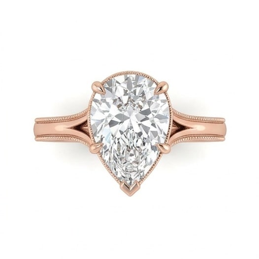 IGI Certified 1.65 ct Pear Cut Natural Diamond Heritage Vintage Ring in 14K Rose Gold: This distinguished 1.65 carat natural pear-cut diamond ring is beautifully crafted in 14K Rose Gold, offering exceptional brilliance and enduring appeal. This design highlights the beauty of the cente