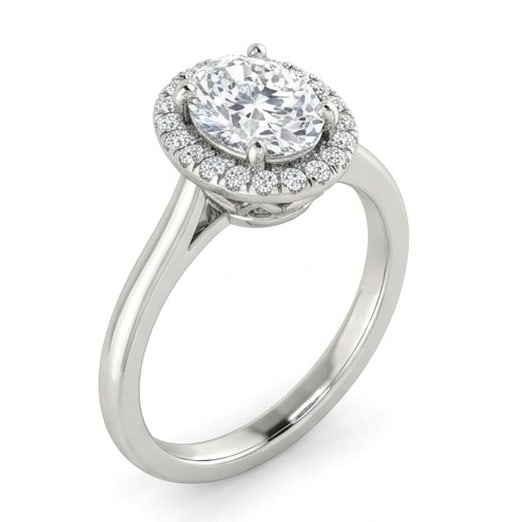 GIA Certified 1.6 ct Oval Cut Natural Diamond Crown Frame Halo Ring in 14K White Gold: This distinguished 1.6 carat natural oval-cut diamond ring is beautifully crafted in 14K White Gold, offering exceptional brilliance and enduring appeal. This design is enhanced with matching diamond 