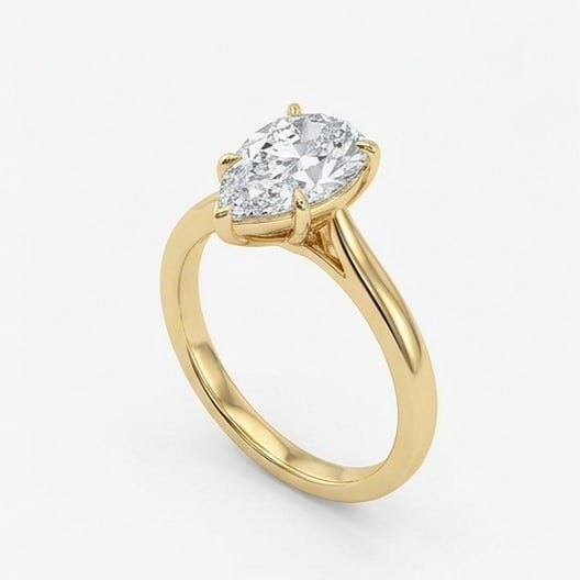 IGI Certified 1.9 ct Pear Cut Natural Diamond Refined Solitaire Ring in 14K Yellow Gold: An exceptional 1.9 carat natural pear-cut diamond ring, masterfully crafted in luxurious 14K Yellow Gold and designed to embody refined elegance and lasting beauty. This design highlights the beauty o