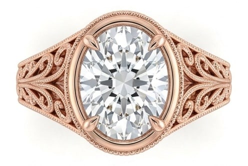 GIA Certified 1.5 ct Oval Cut Natural Diamond Heritage Scroll Ring in 14K Rose Gold: A sophisticated 1.5 carat natural oval-cut diamond ring, crafted in 14K Rose Gold to highlight beauty, brilliance, and fine jewelry presence. This design highlights the beauty of the center stone alon