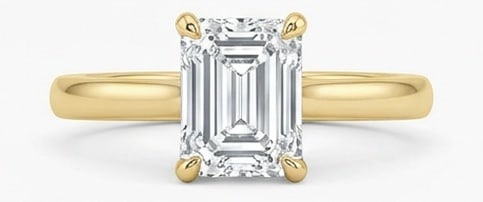 IGI Certified 1.4 ct Emerald Cut Natural Diamond Raised Cathedral Solitaire Ring in 14K Yellow Gold: A sophisticated 1.4 carat natural emerald-cut diamond ring, crafted in 14K Yellow Gold to highlight beauty, brilliance, and fine jewelry presence. This design highlights the beauty of the center stone