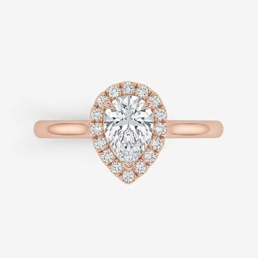 IGI Certified 1.7 ct Pear Cut Natural Diamond Scalloped Halo Ring in 14K Rose Gold: An exceptional 1.7 carat natural pear-cut diamond ring, masterfully crafted in luxurious 14K Rose Gold and designed to embody refined elegance and lasting beauty. This design is enhanced with matching