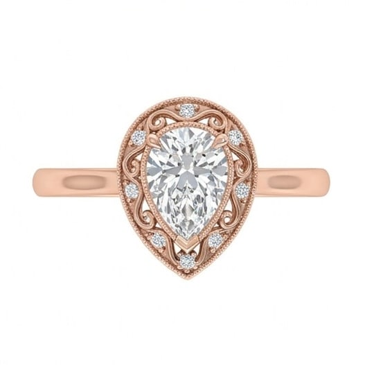 GIA Certified 1.6 ct Pear Cut Natural Diamond Antique Border Ring in 14K Rose Gold: An elegant 1.6 carat natural pear-cut diamond ring, finely made in 14K Rose Gold with a refined profile and auction-worthy presentation. This design is enhanced with matching diamond side stones, addi