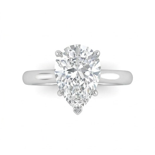 IGI Certified 1.55 ct Pear Cut Natural Diamond Refined Solitaire Ring in 14K White Gold: This distinguished 1.55 carat natural pear-cut diamond ring is beautifully crafted in 14K White Gold, offering exceptional brilliance and enduring appeal. This design highlights the beauty of the cent