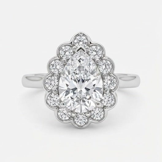 GIA Certified 1.3 ct Pear Cut Natural Diamond Rosette Halo Ring in 14K White Gold: A sophisticated 1.3 carat natural pear-cut diamond ring, crafted in 14K White Gold to highlight beauty, brilliance, and fine jewelry presence. This design is enhanced with matching diamond side stones