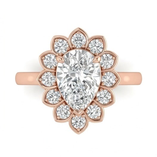 GIA Certified 1.4 ct Pear Cut Natural Diamond Floral Halo Ring in 14K Rose Gold: A remarkable 1.4 carat natural pear-cut diamond ring, expertly crafted in 14K Rose Gold and created to showcase timeless sophistication. This design is enhanced with matching diamond side stones, addi