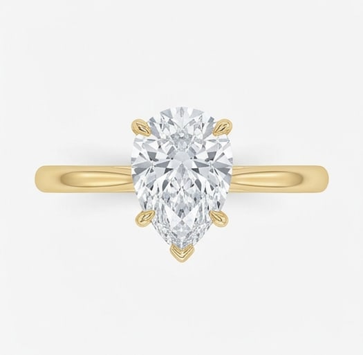 GIA Certified 1.7 ct Pear Cut Natural Diamond Refined Solitaire Ring in 14K Yellow Gold: An exceptional 1.7 carat natural pear-cut diamond ring, masterfully crafted in luxurious 14K Yellow Gold and designed to embody refined elegance and lasting beauty. This design highlights the beauty o